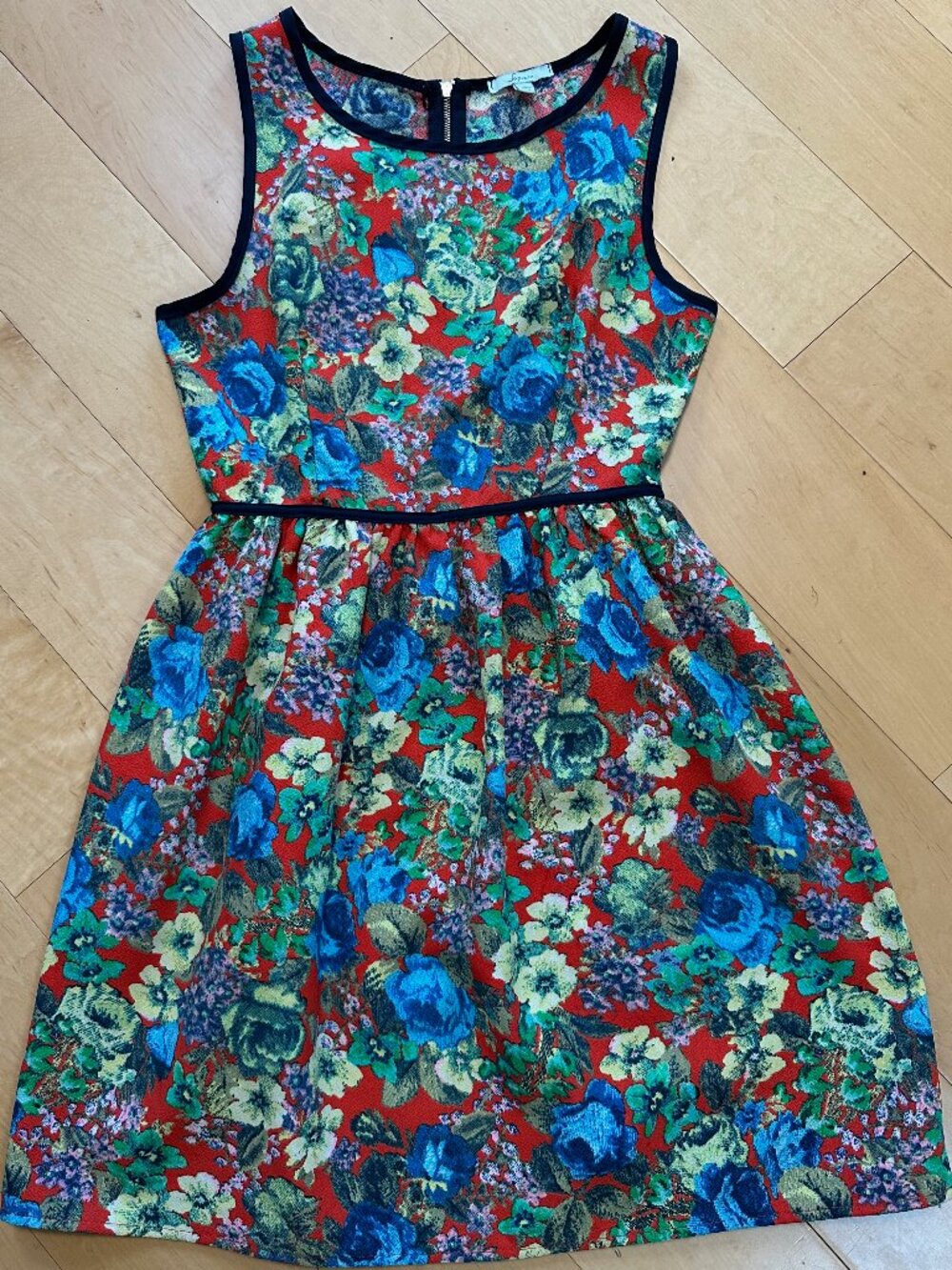 Vibrant Floral Sleeveless Dress with Black Trim